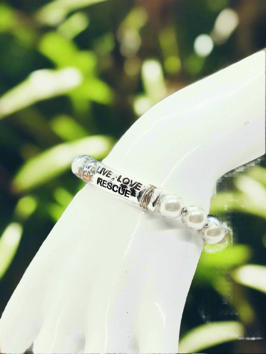https://www.artistryjewelry.net/products/rescue-that-dog-bracelet