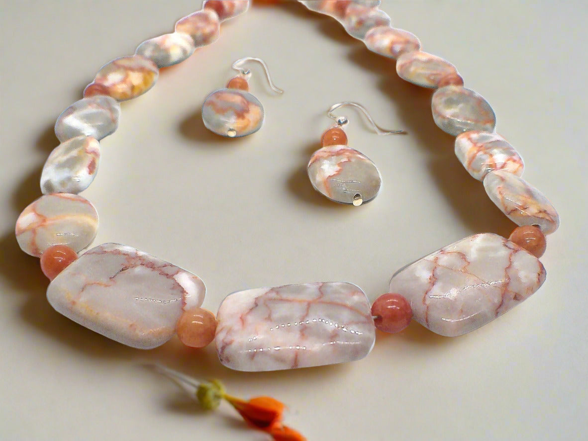 https://www.artistryjewelry.net/products/exciting-red-spot-stone-delight-necklace-set
