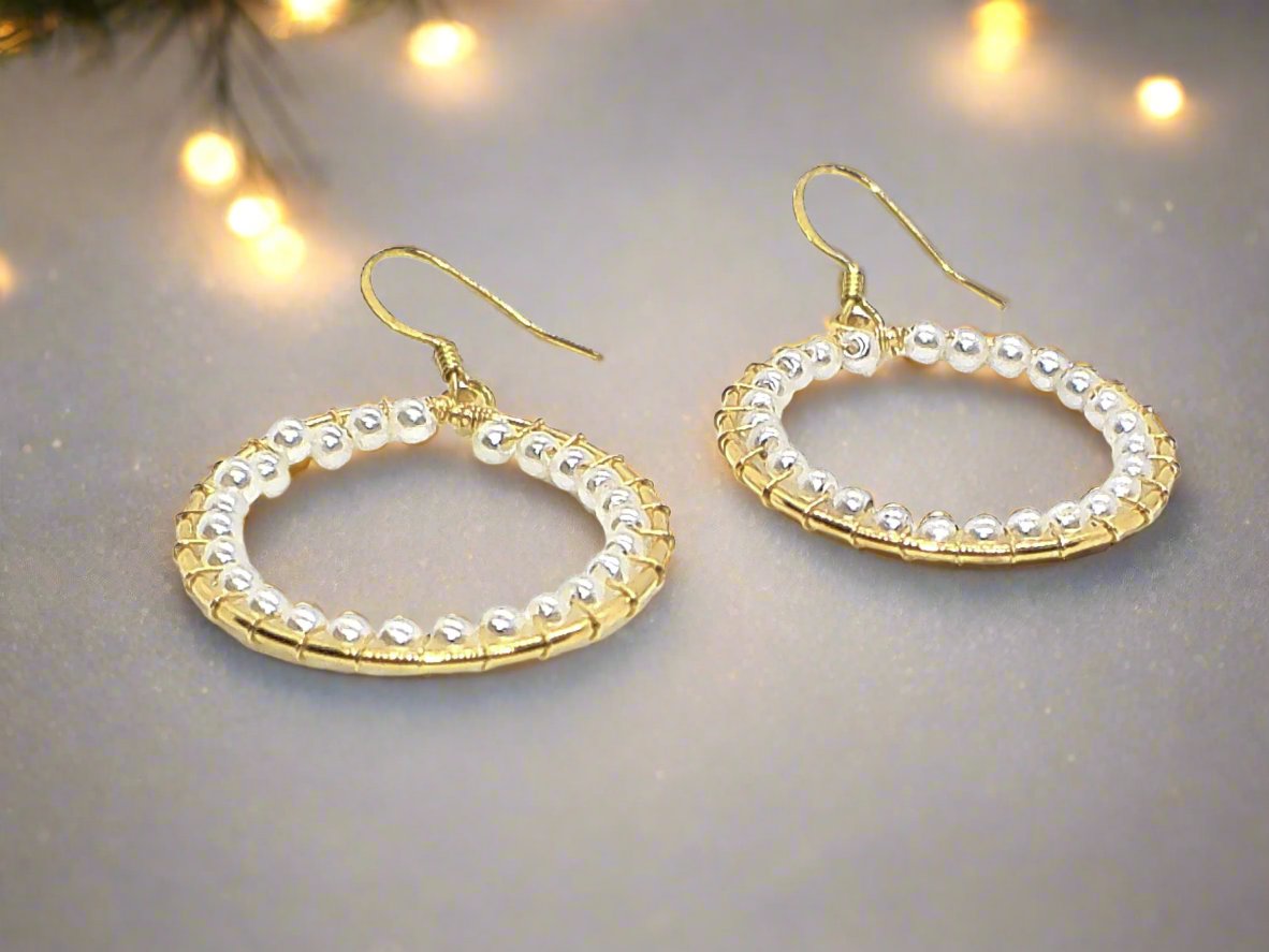 https://www.artistryjewelry.net/products/lovely-pearl-hoops-earrings
