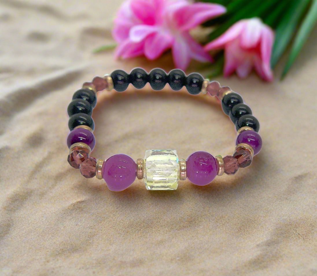 Go To: https://www.artistryjewelry.net/products/amethyst-and-black-garnet-yoga-bracelet