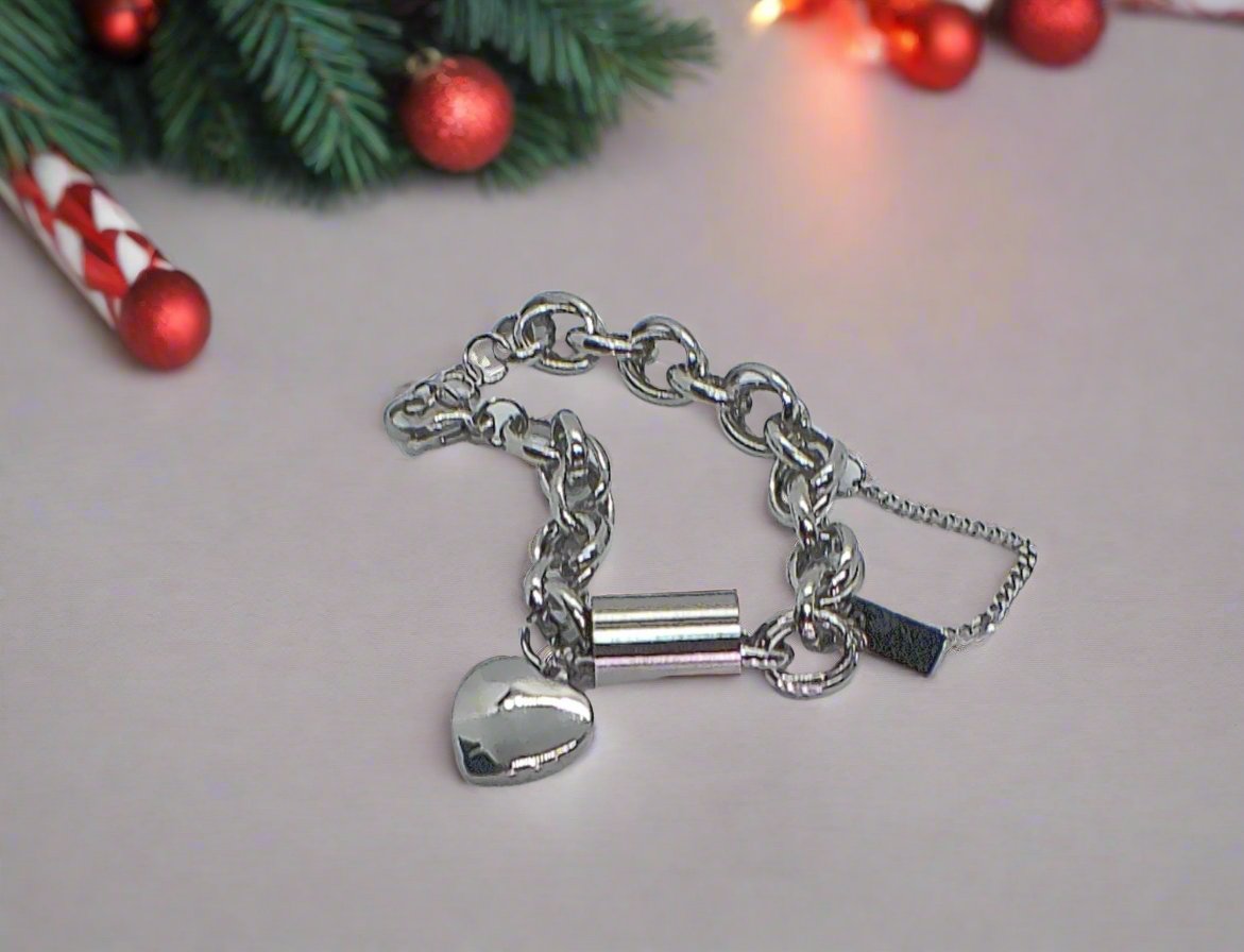 https://www.artistryjewelry.net/products/exciting-silver-heart-and-chain-bracelet
