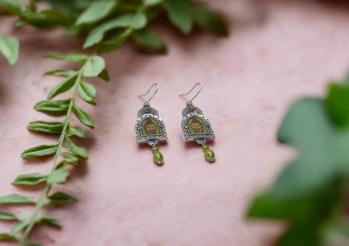 https://www.artistryjewelry.net/products/lovely-owl-in-the-window-earrings
