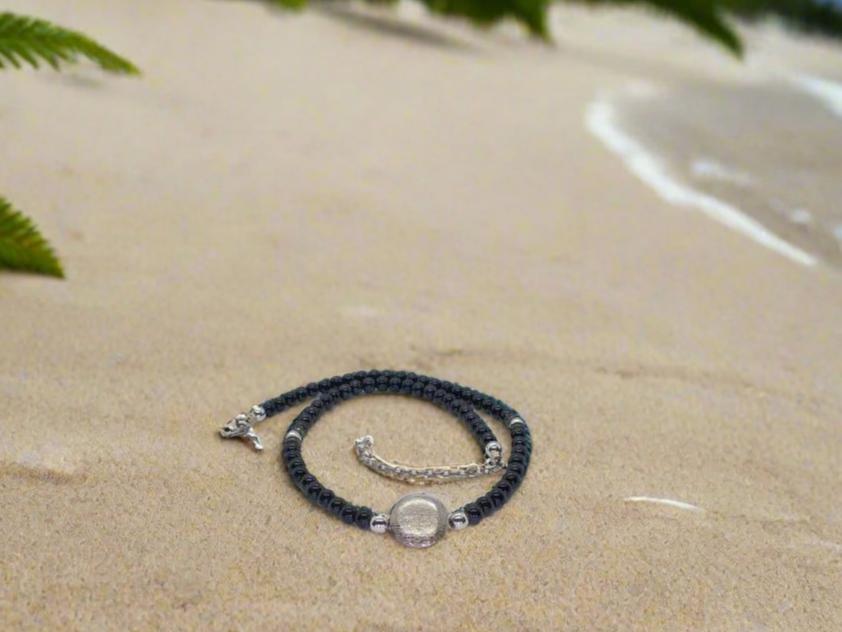 https://www.artistryjewelry.net/products/black-luster-necklace