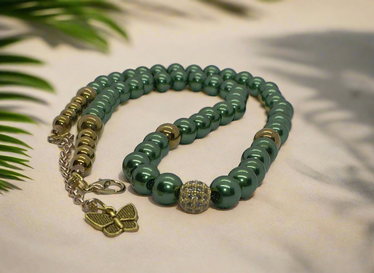 https://www.artistryjewelry.net/products/stunning-olive-green-and-hematite-necklace