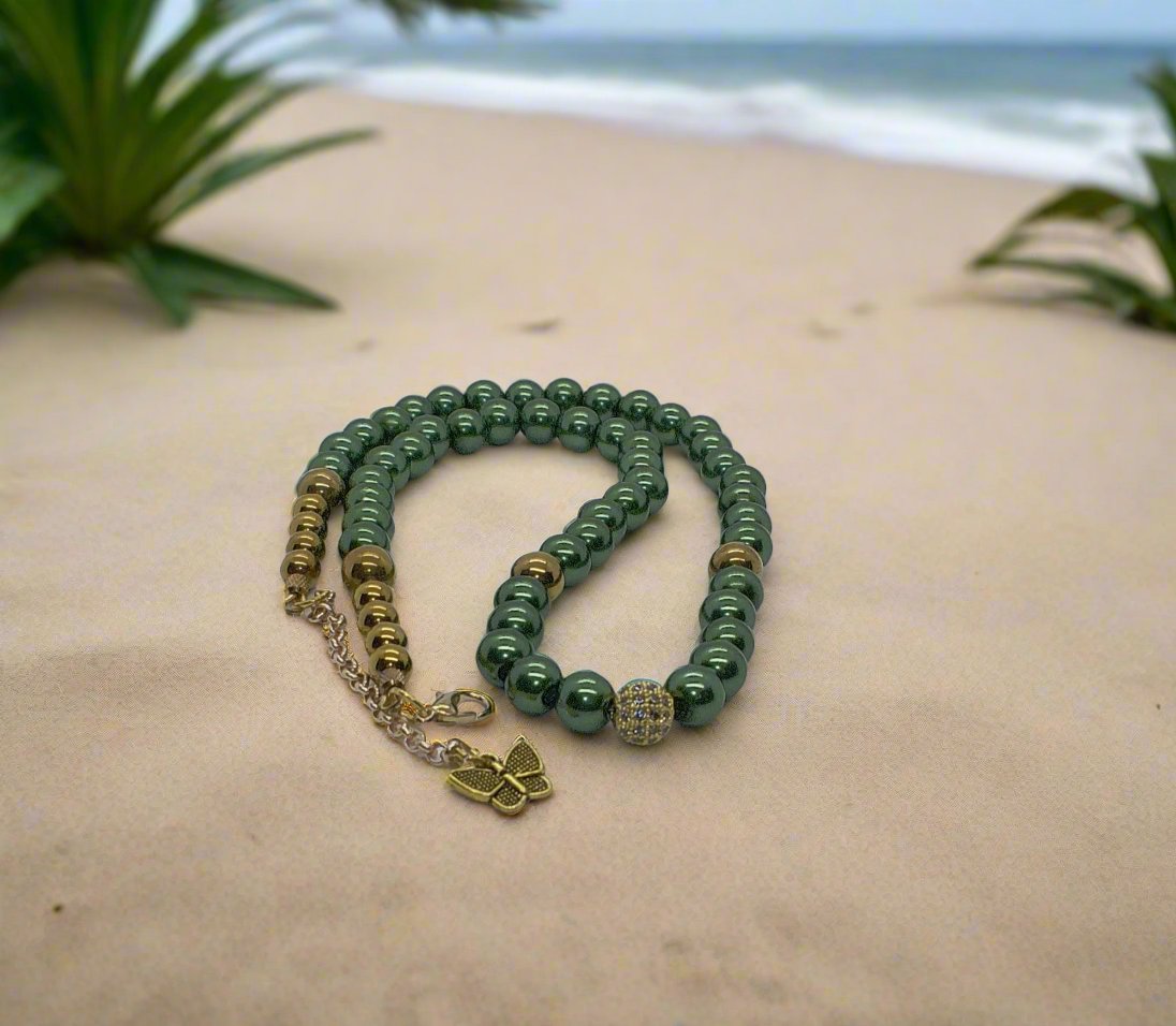 https://www.artistryjewelry.net/products/stunning-olive-green-and-hematite-necklace