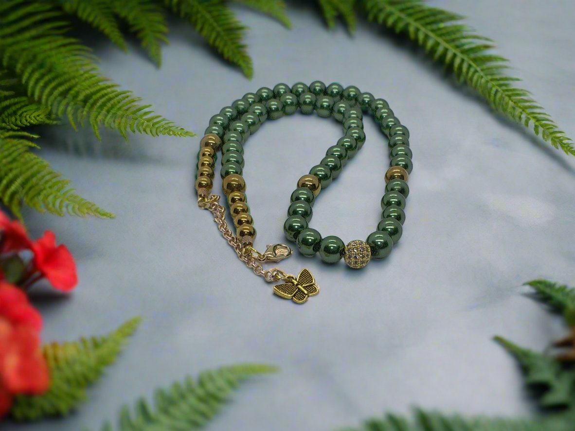 https://www.artistryjewelry.net/products/stunning-olive-green-and-hematite-necklace