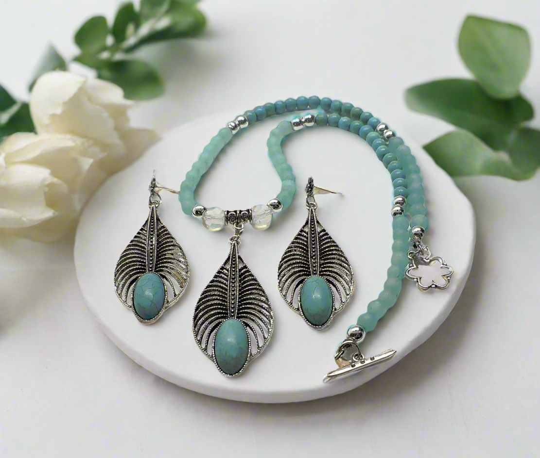 https://www.artistryjewelry.net/products/turquoise-teardrop-necklace-set