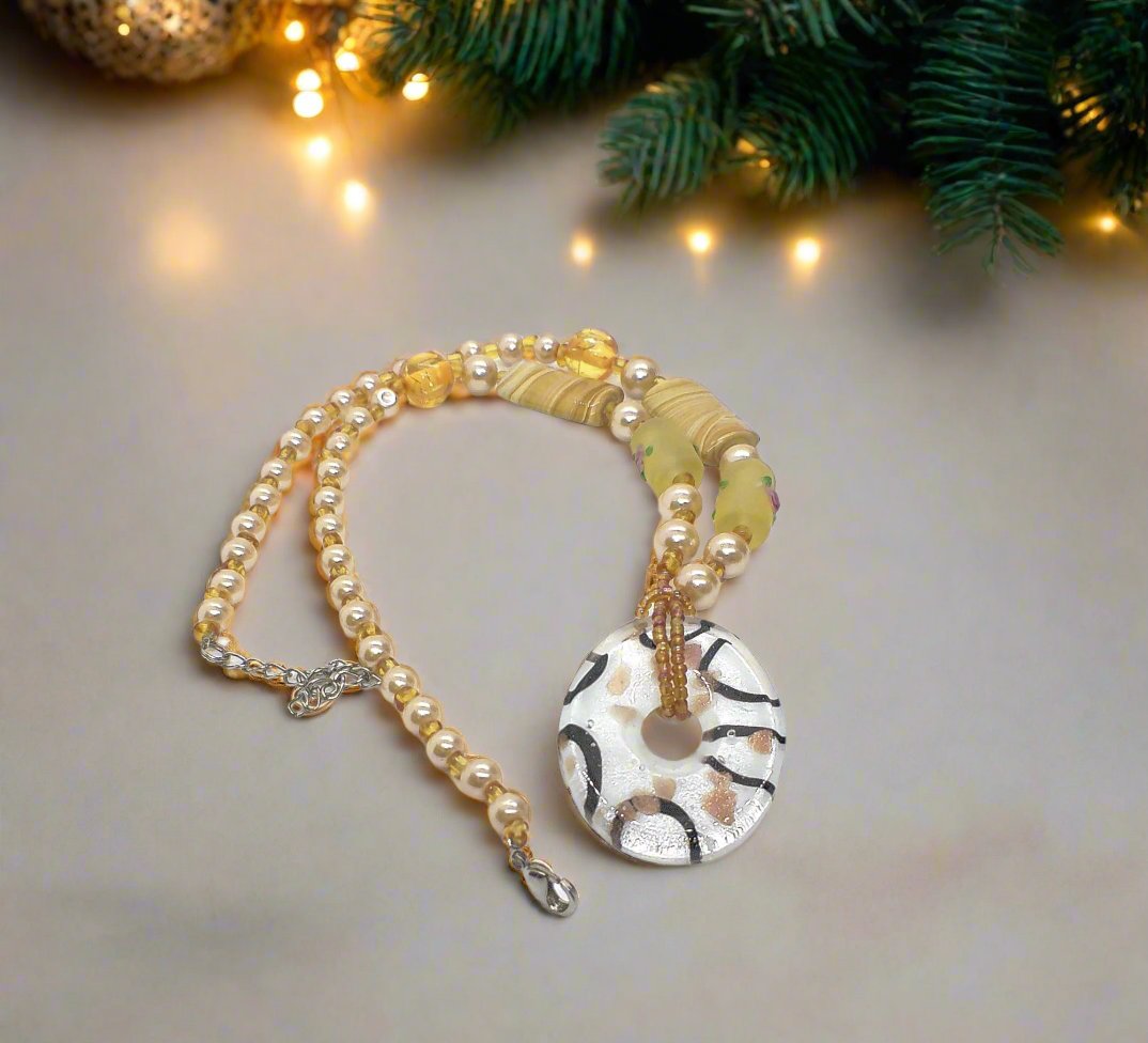 https://www.artistryjewelry.net/products/charming-peach-necklace