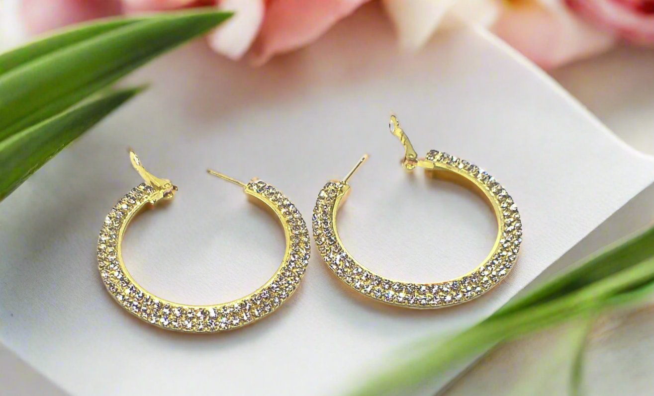 https://www.artistryjewelry.net/products/dazzling-gold-hoops
