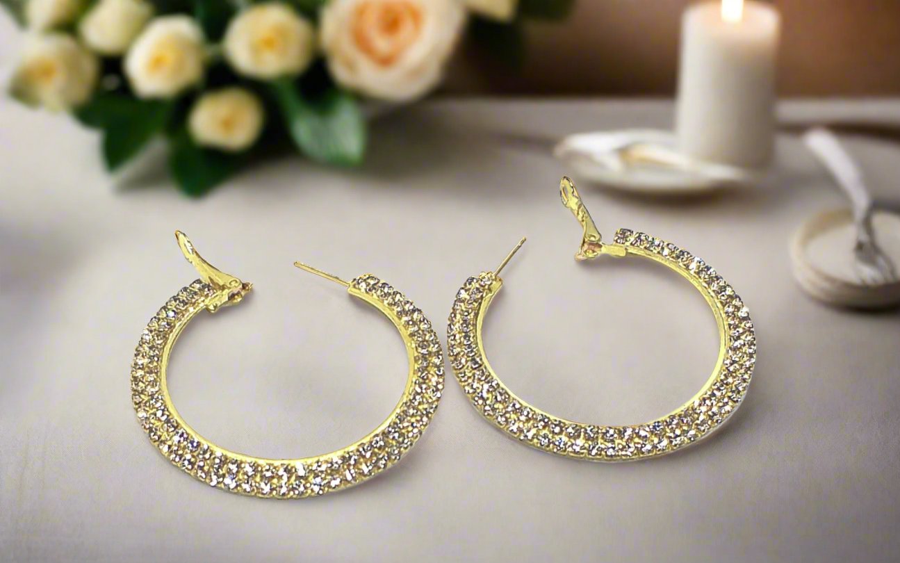 https://www.artistryjewelry.net/products/dazzling-gold-hoops