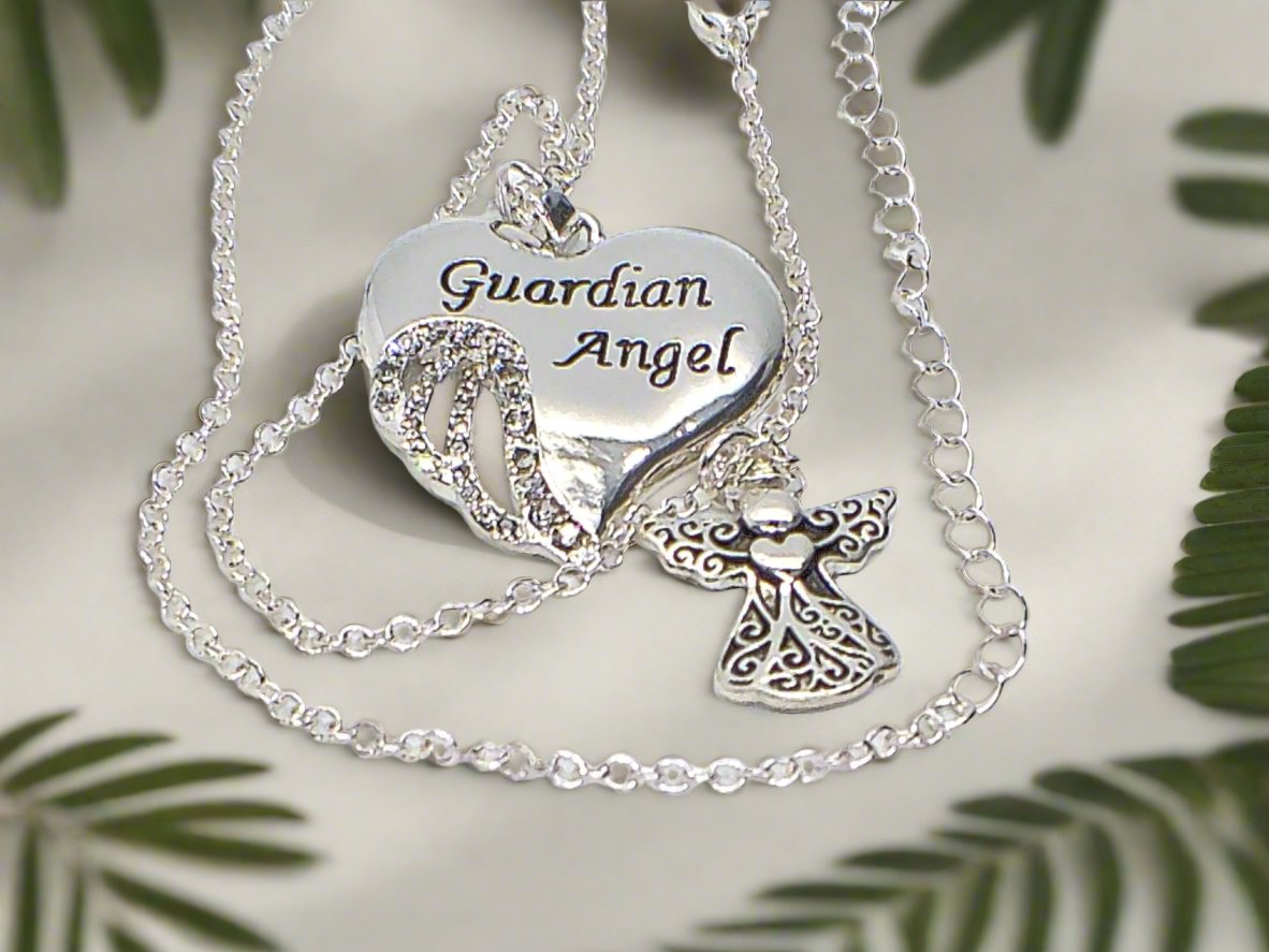 https://www.artistryjewelry.net/products/lovely-guardian-angel-necklace