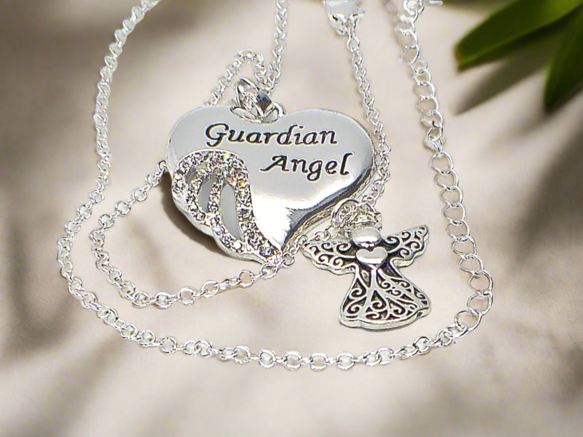 https://www.artistryjewelry.net/products/lovely-guardian-angel-necklace