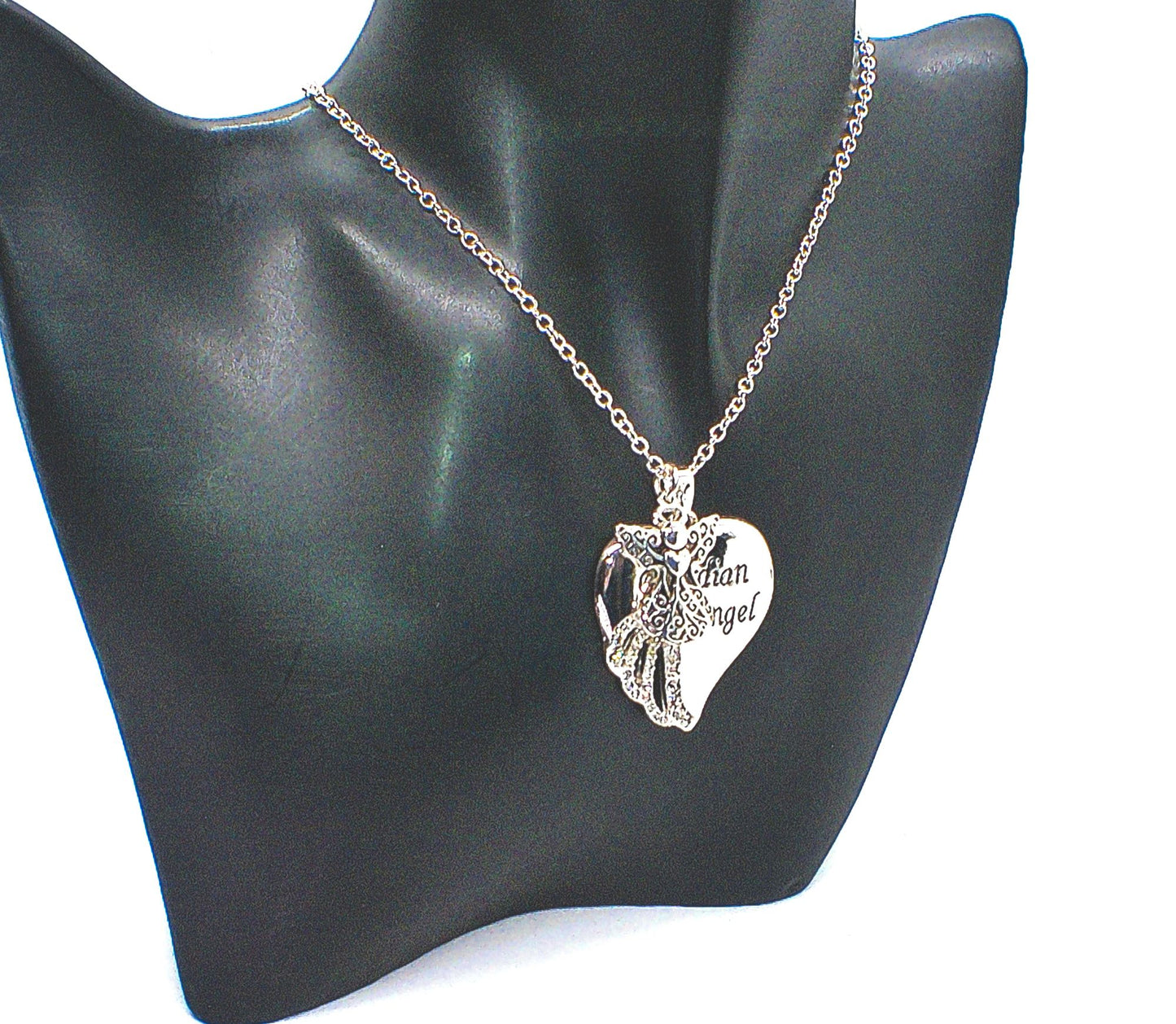 https://www.artistryjewelry.net/products/lovely-guardian-angel-necklace