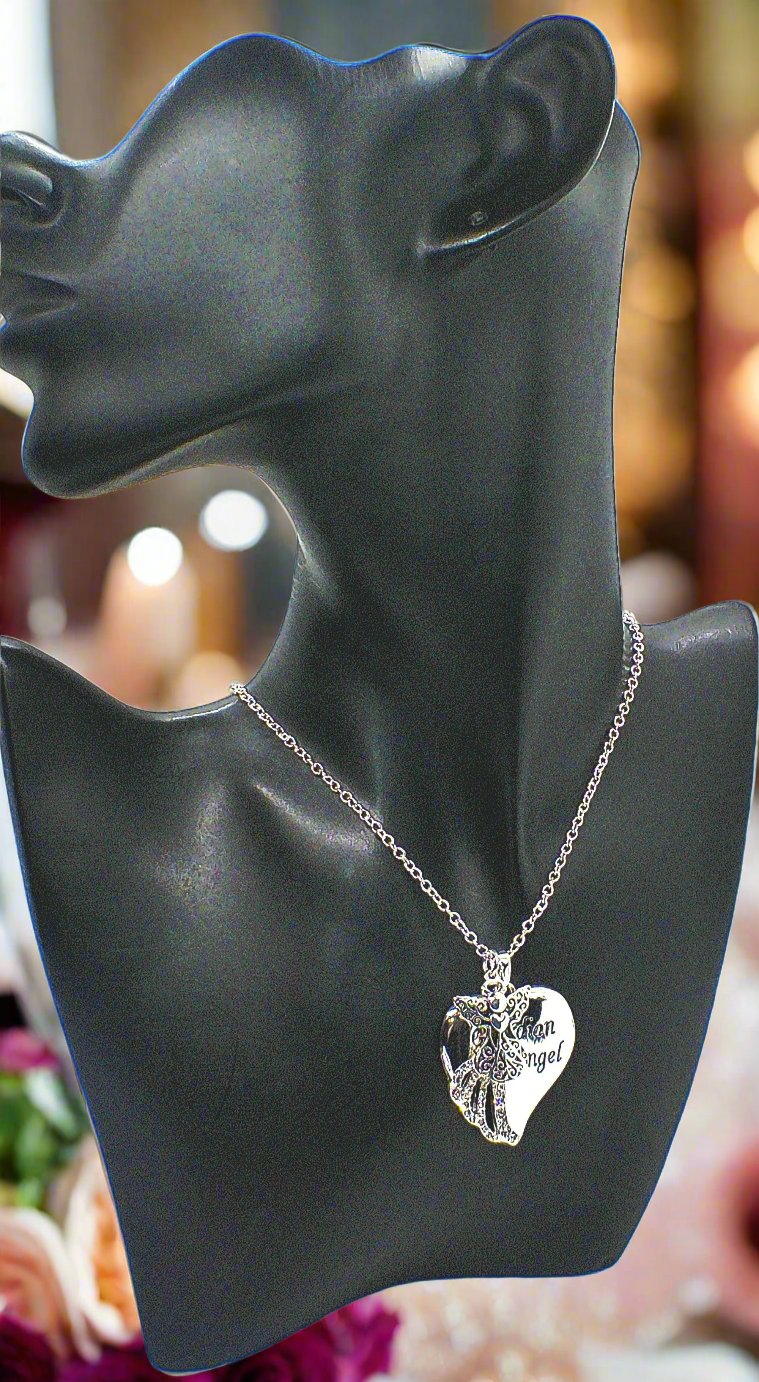 https://www.artistryjewelry.net/products/lovely-guardian-angel-necklace