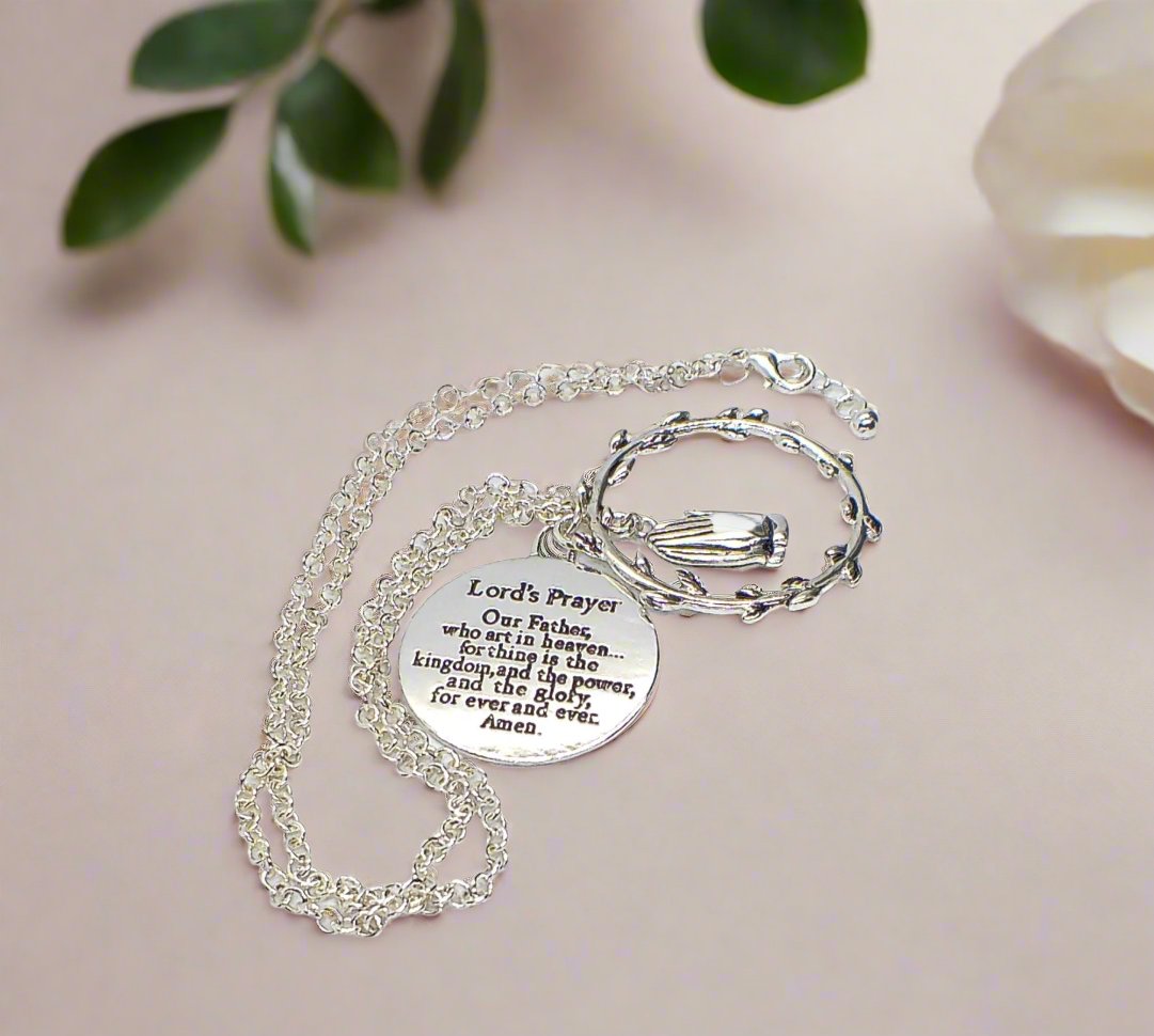https://www.artistryjewelry.net/products/the-lords-prayer-necklace