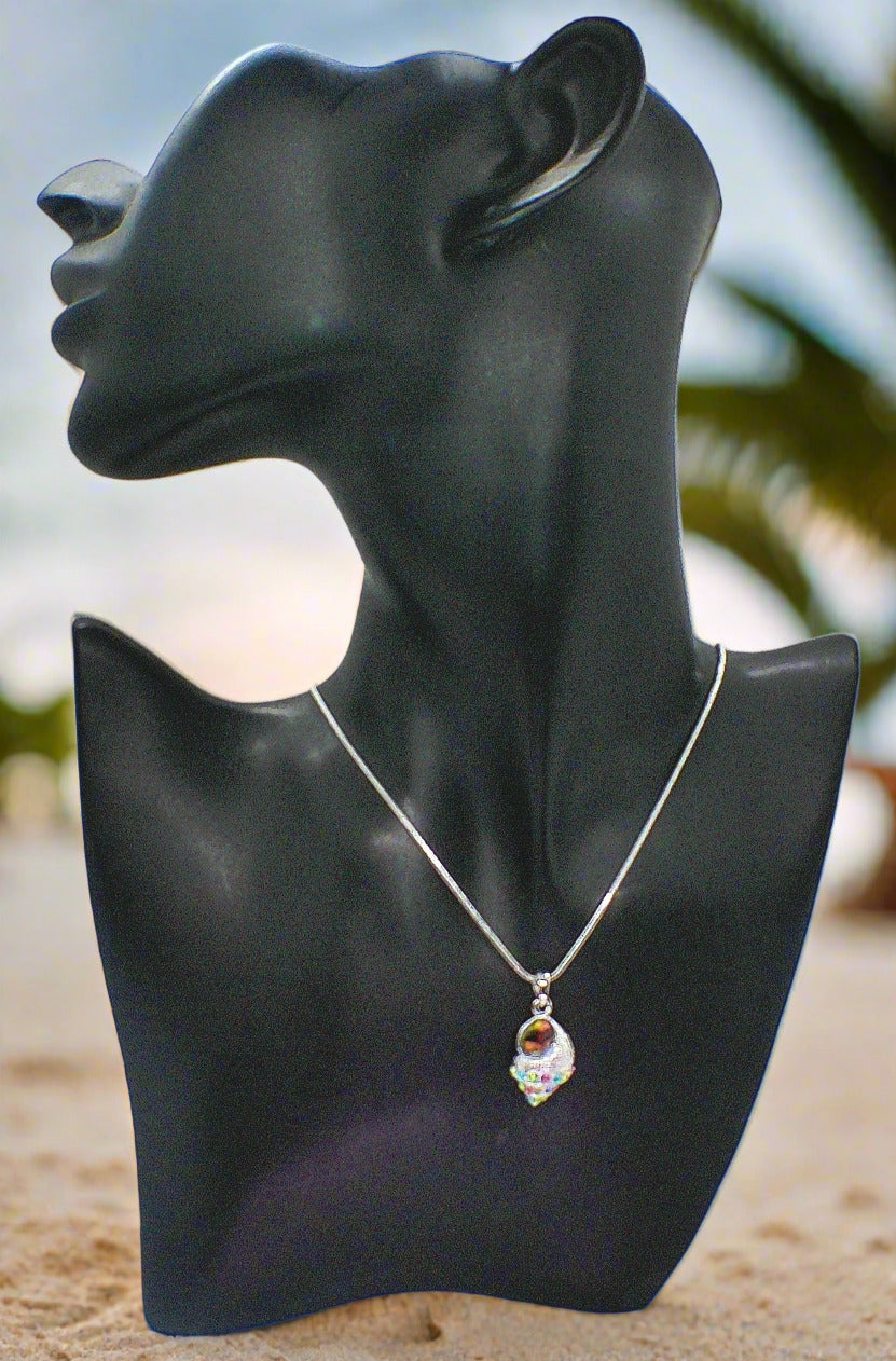 https://www.artistryjewelry.net/products/trempet-shell-pendant-necklace