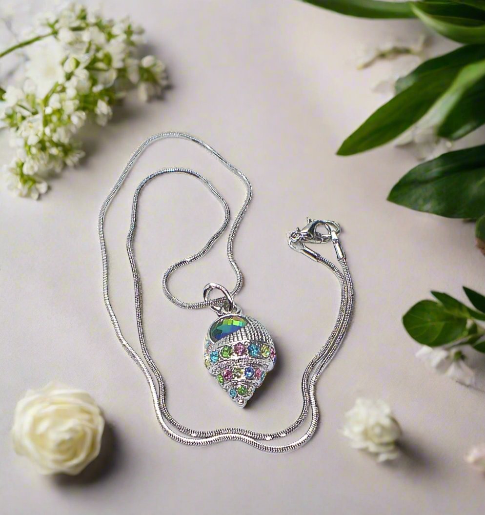 https://www.artistryjewelry.net/products/trempet-shell-pendant-necklace