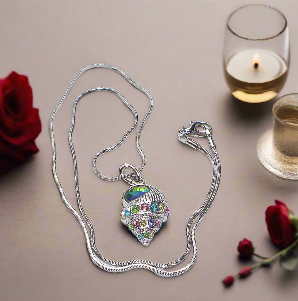 https://www.artistryjewelry.net/products/trempet-shell-pendant-necklace