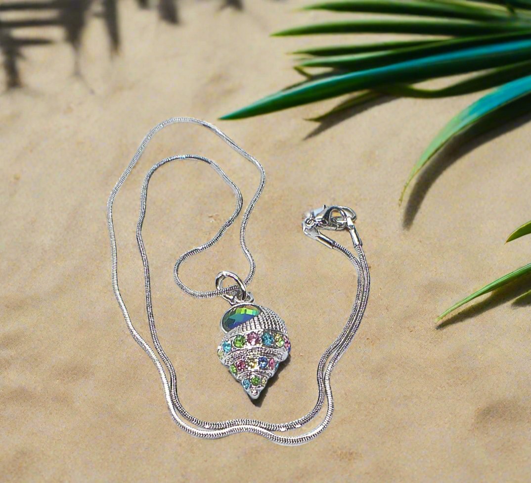 https://www.artistryjewelry.net/products/trempet-shell-pendant-necklace