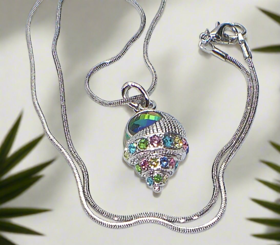 https://www.artistryjewelry.net/products/trempet-shell-pendant-necklace