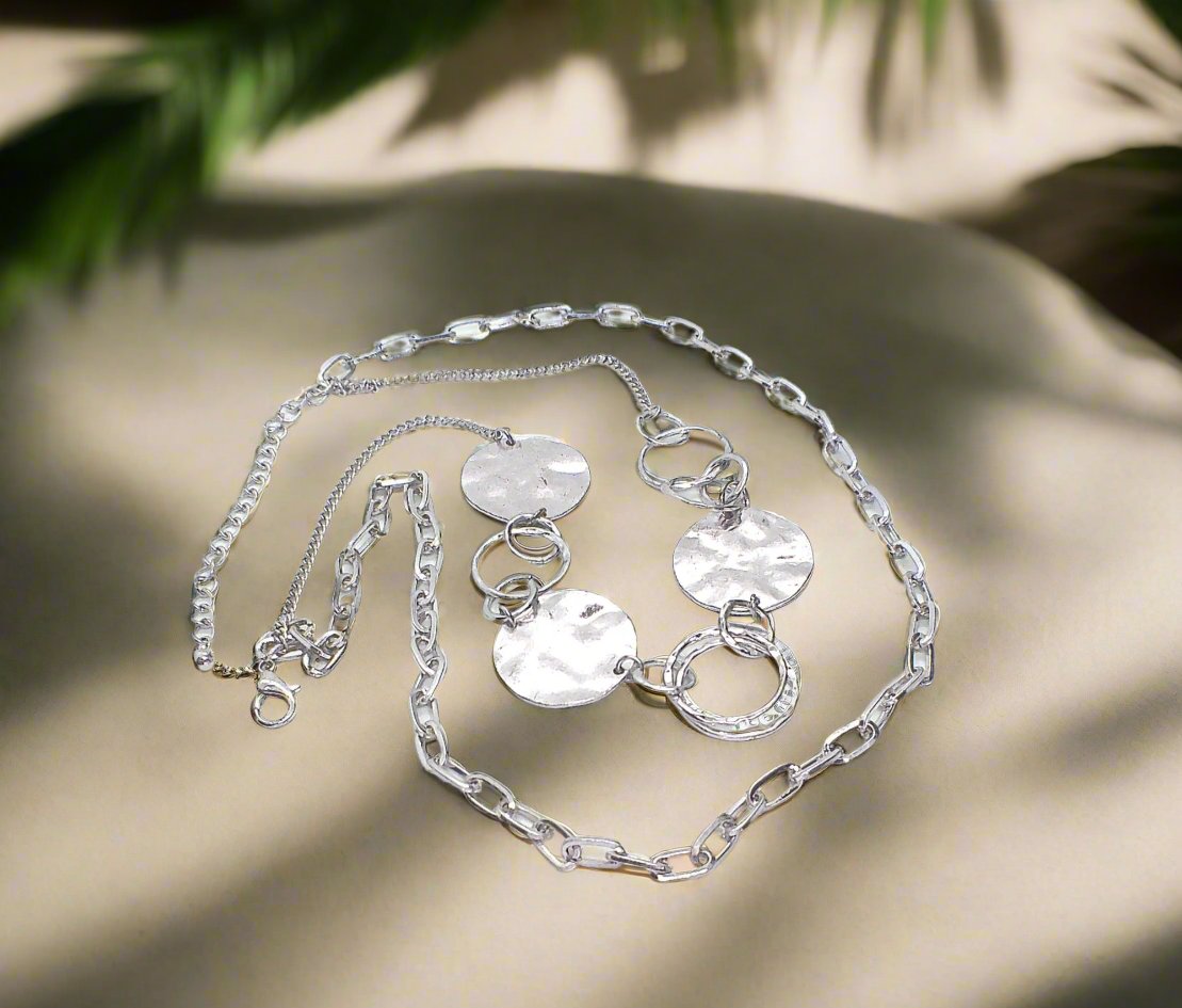 https://www.artistryjewelry.net/products/hammered-disc-necklace