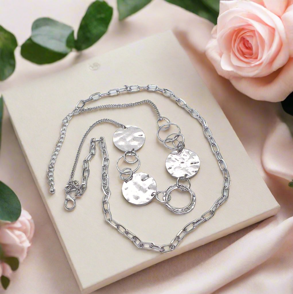 https://www.artistryjewelry.net/products/hammered-disc-necklace