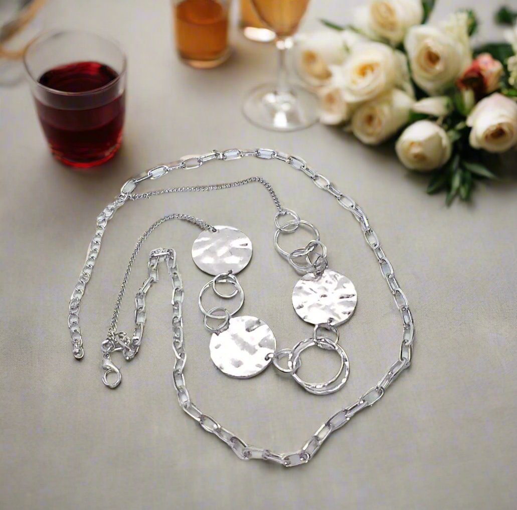 https://www.artistryjewelry.net/products/hammered-disc-necklace