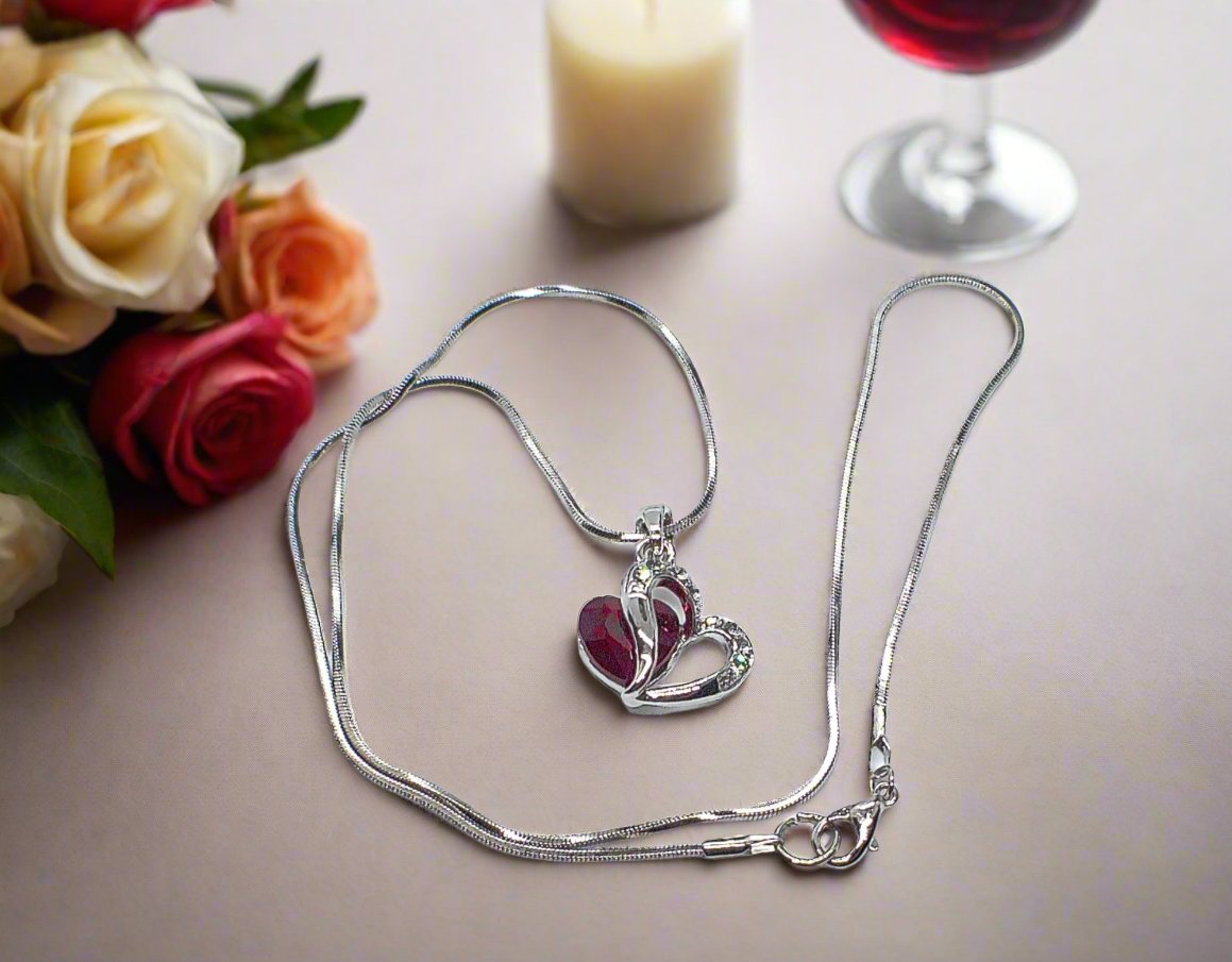 https://www.artistryjewelry.net/products/red-crystal-heart-necklace