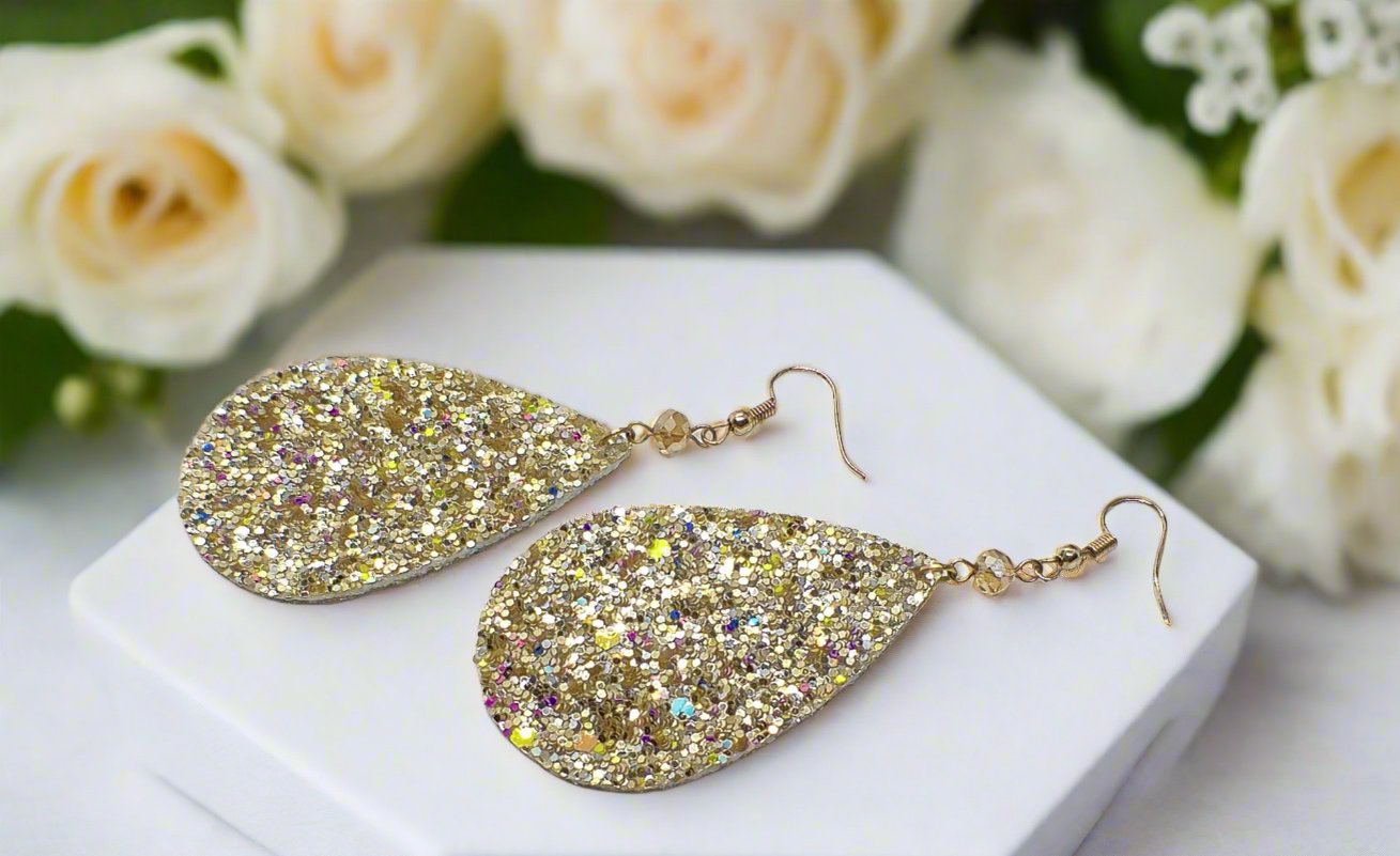 https://www.artistryjewelry.net/products/glittering-teardrop-leather-earrings