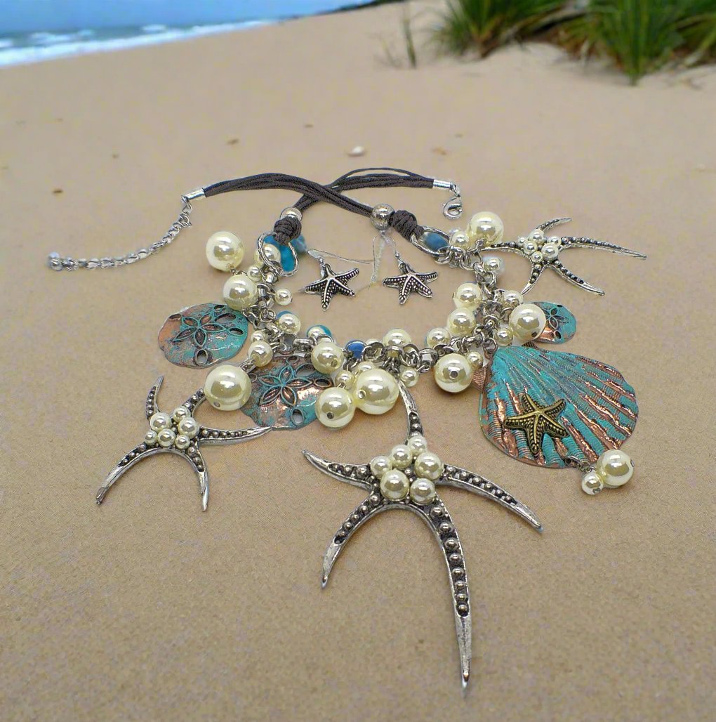 https://www.artistryjewelry.net/products/starfish-and-shell-statement-necklaces-set