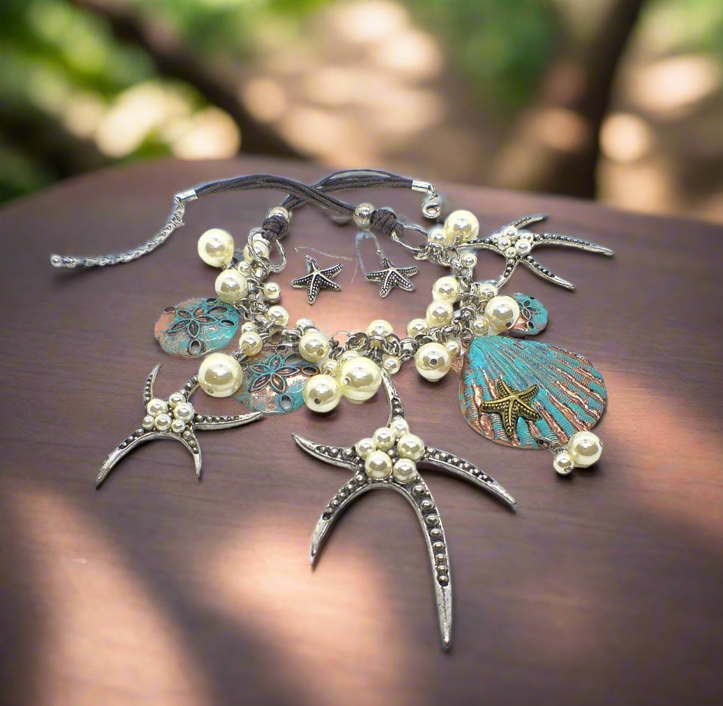 https://www.artistryjewelry.net/products/starfish-and-shell-statement-necklaces-set