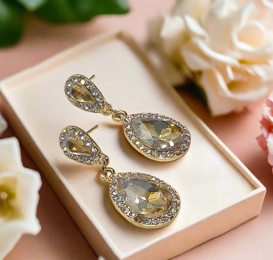 https://www.artistryjewelry.net/products/champagne-teardrop-rhinestone-earrings