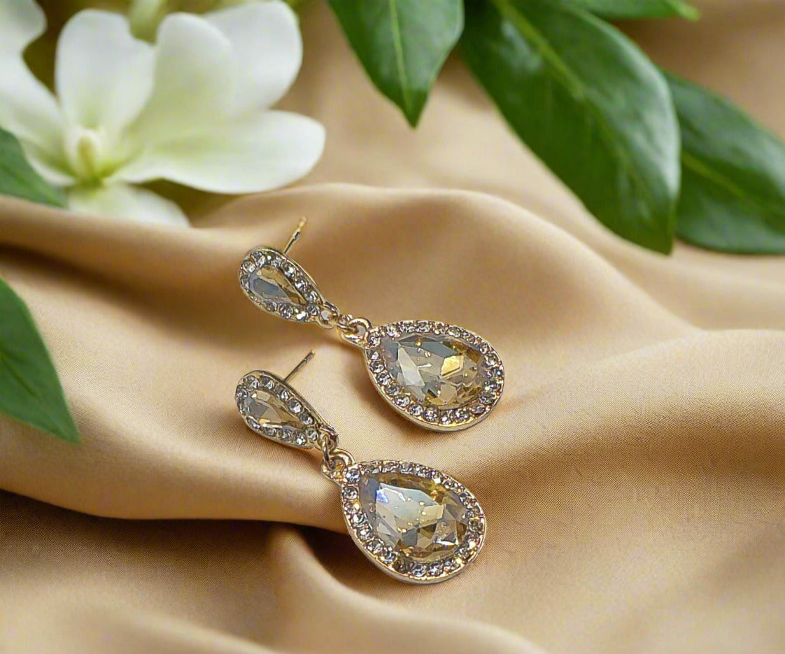 https://www.artistryjewelry.net/products/champagne-teardrop-rhinestone-earrings