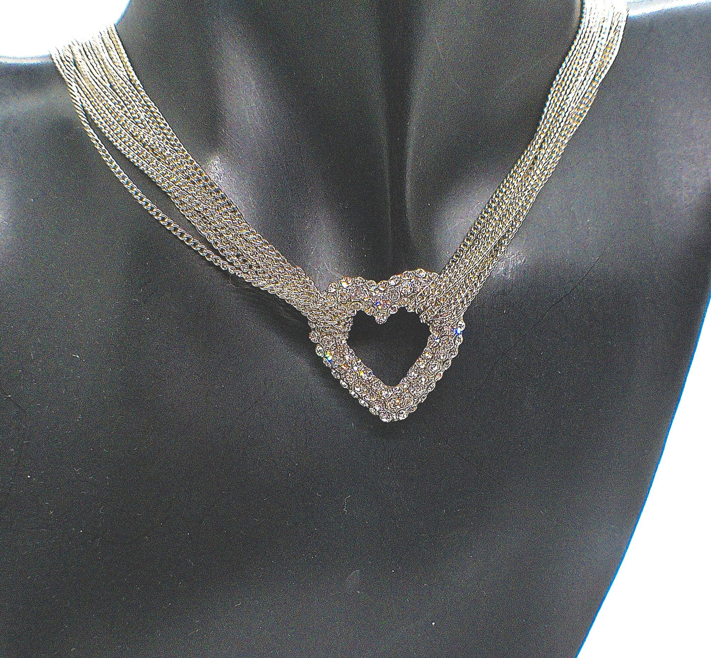 https://www.artistryjewelry.net/products/multi-chain-pave-heart-necklace