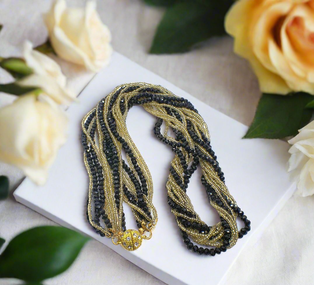 https://www.artistryjewelry.net/products/multi-strand-beaded-twist-necklace