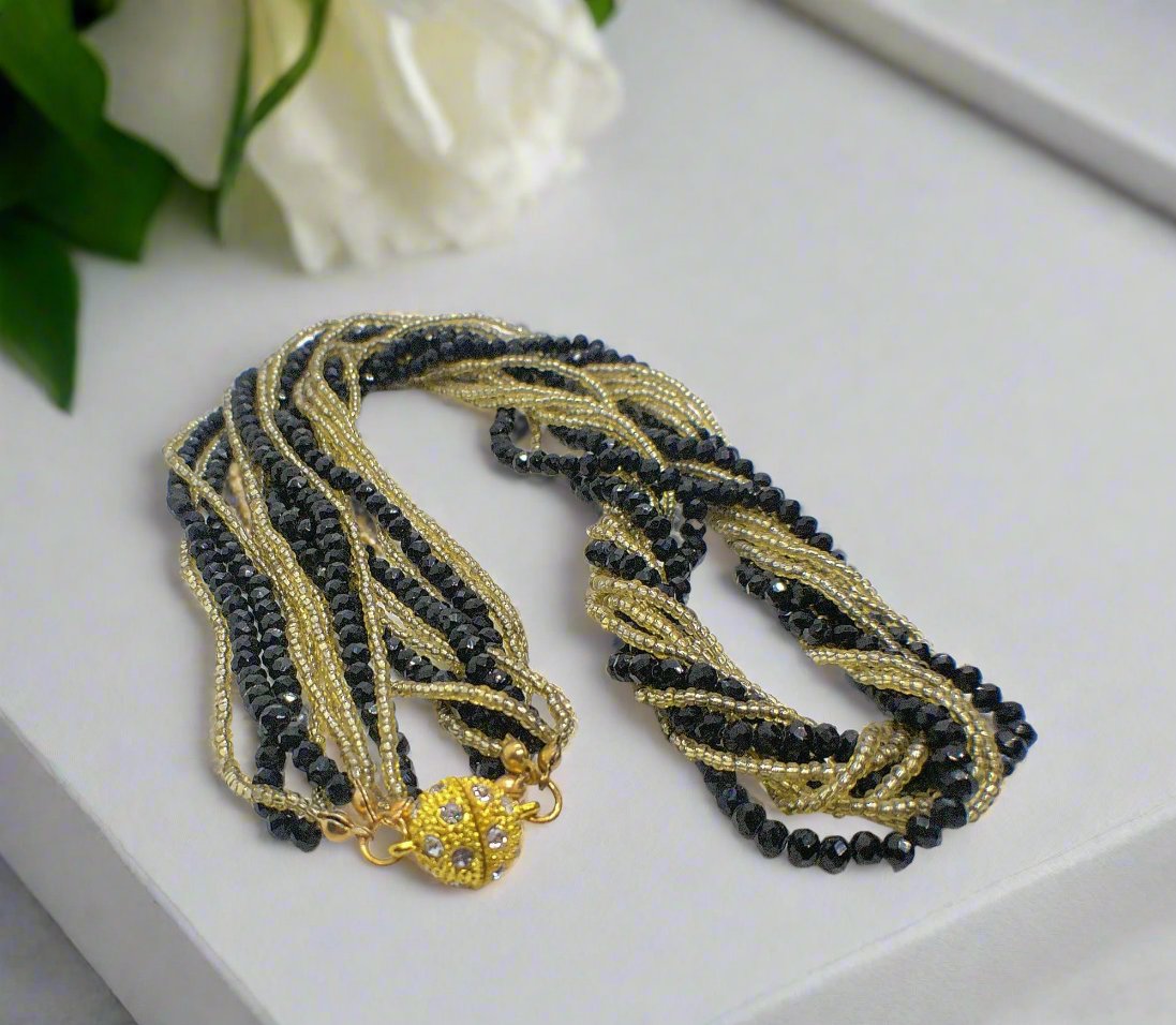 https://www.artistryjewelry.net/products/multi-strand-beaded-twist-necklace