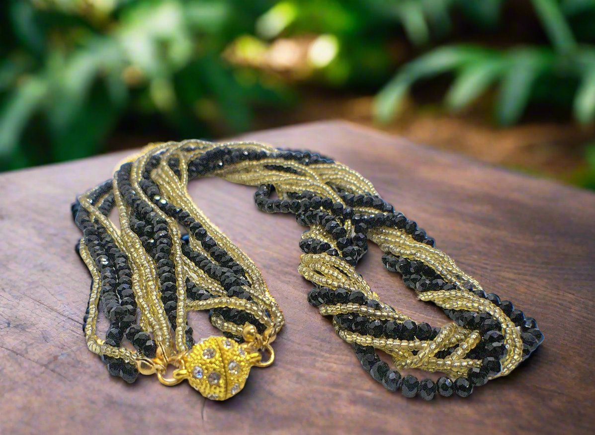 https://www.artistryjewelry.net/products/multi-strand-beaded-twist-necklace