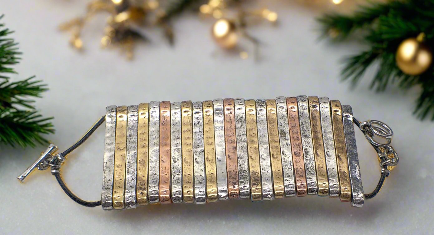 https://www.artistryjewelry.net/products/aged-finished-metal-bracelet