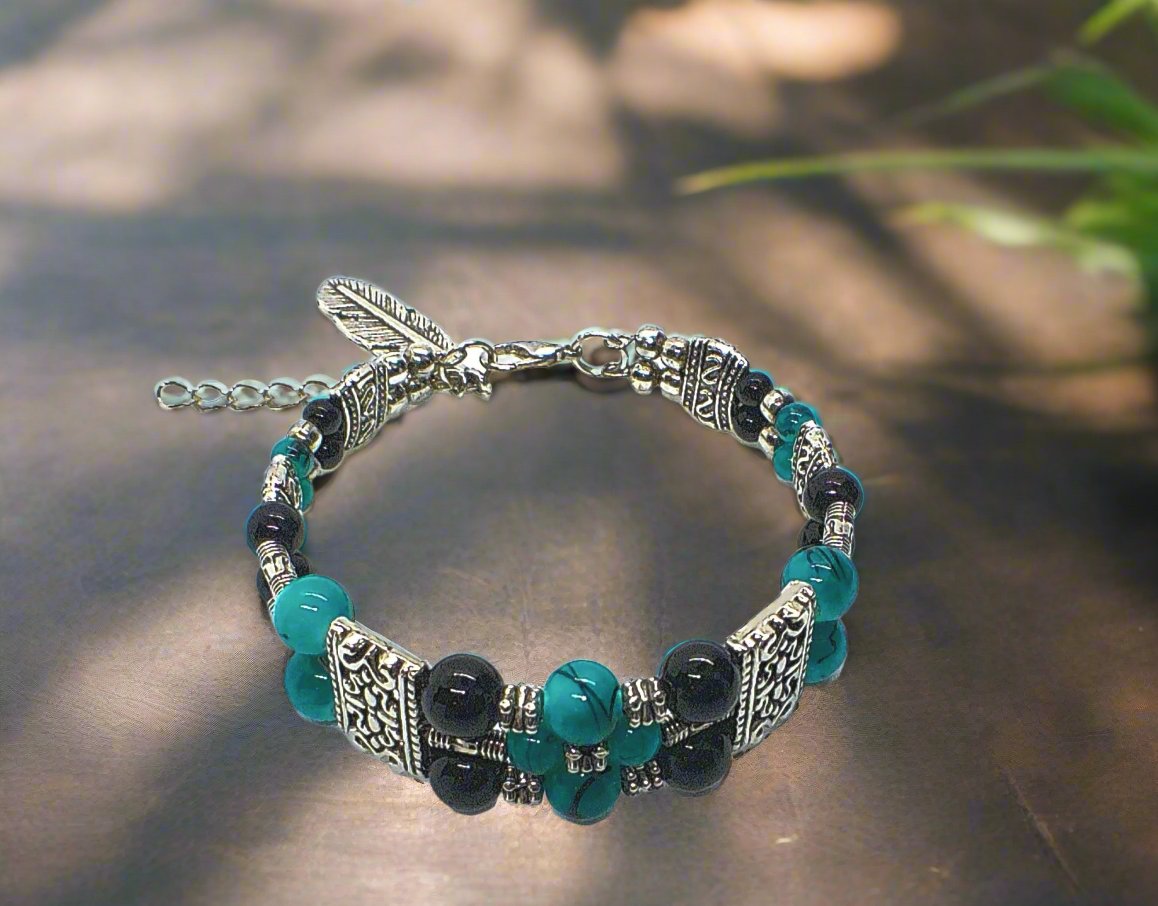 https://www.artistryjewelry.net/products/gorgeous-black-and-turquoise-bracelet