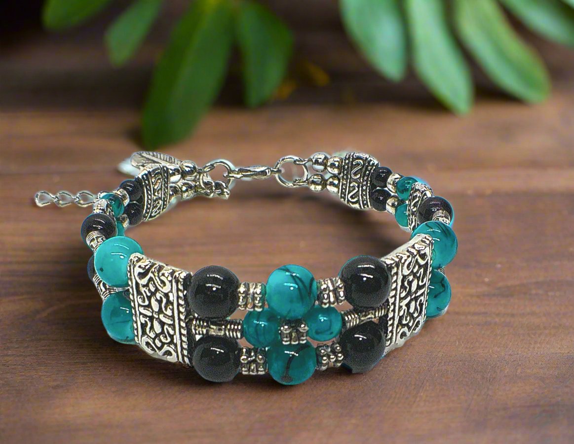https://www.artistryjewelry.net/products/gorgeous-black-and-turquoise-bracelet