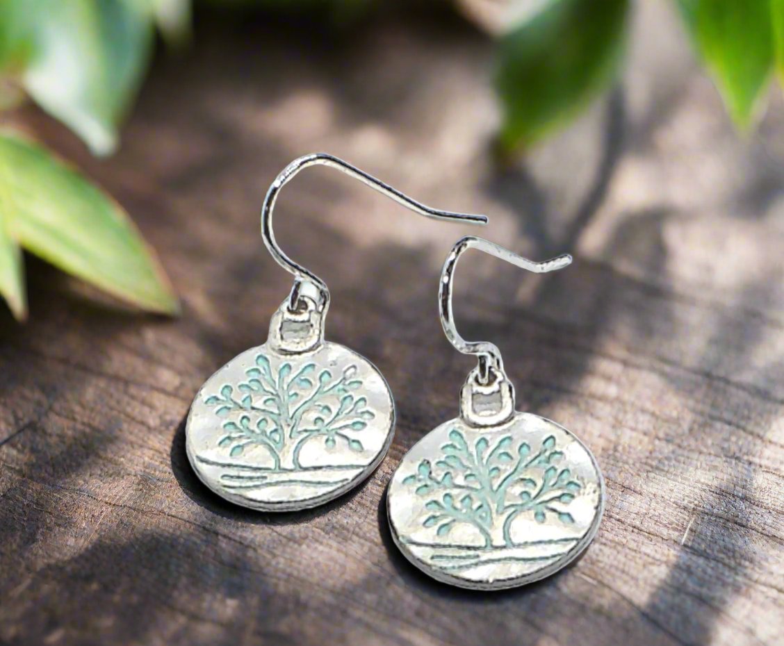 https://www.artistryjewelry.net/products/beautiful-silver-tree-of-life-earrings