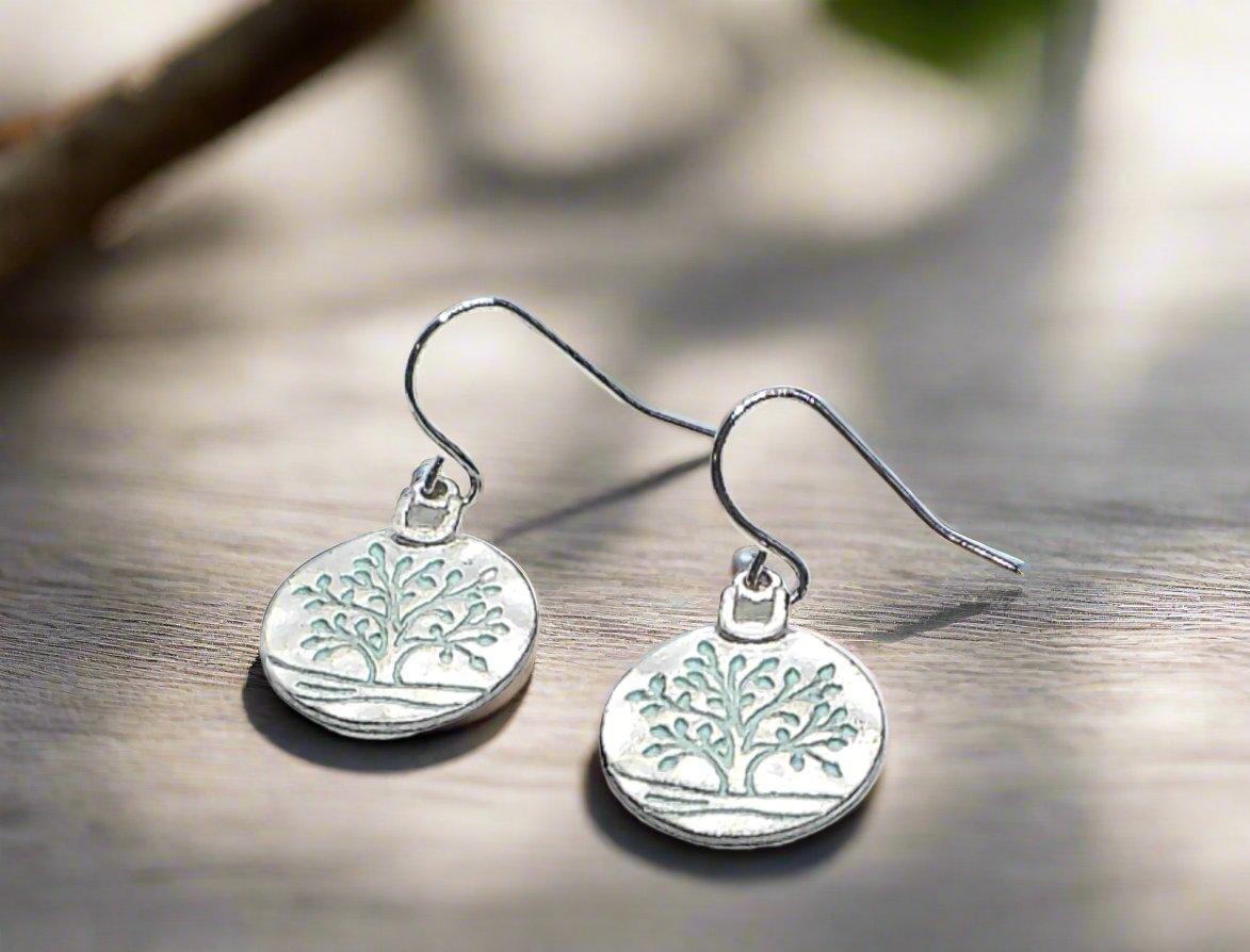 https://www.artistryjewelry.net/products/beautiful-silver-tree-of-life-earrings
