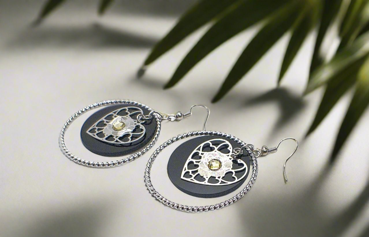 https://www.artistryjewelry.net/products/charming-heart-earrings