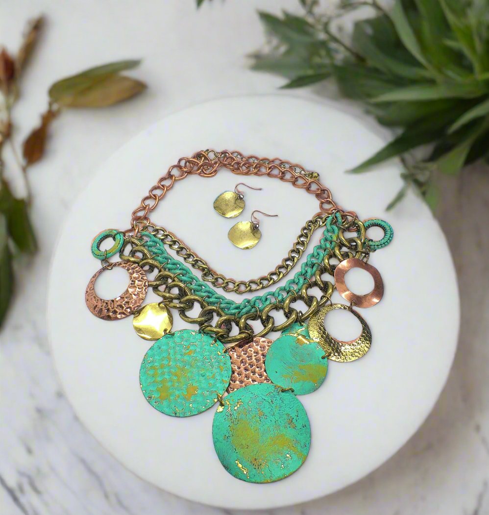 https://www.artistryjewelry.net/products/green-patina-dangle-necklace-set