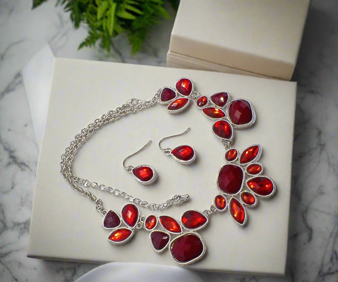 https://www.artistryjewelry.net/products/red-and-silver-necklace-set