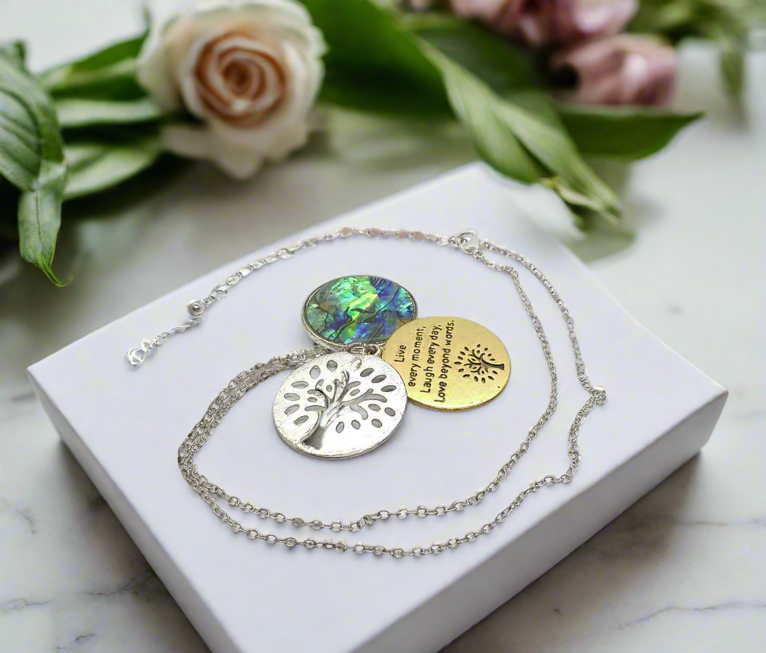 https://www.artistryjewelry.net/products/lovely-triple-circle-abalone-necklace