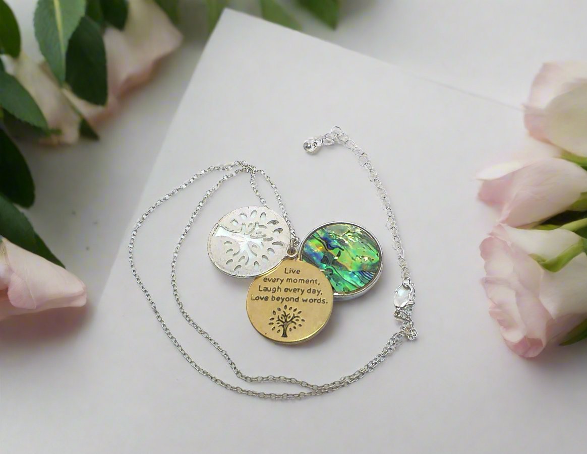 https://www.artistryjewelry.net/products/lovely-triple-circle-abalone-necklace