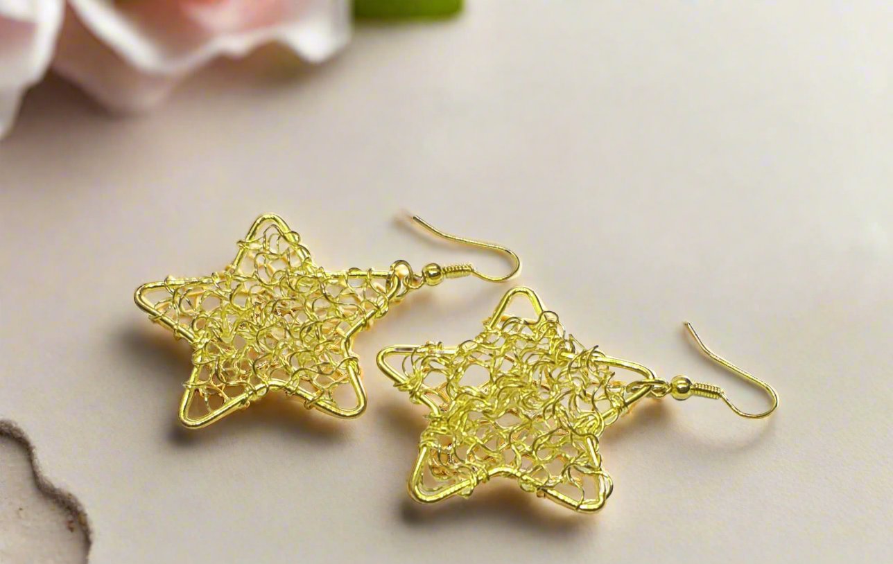 https://www.artistryjewelry.net/products/starlight-earrings
