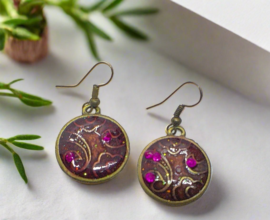 https://www.artistryjewelry.net/products/lovely-purple-earrings-1