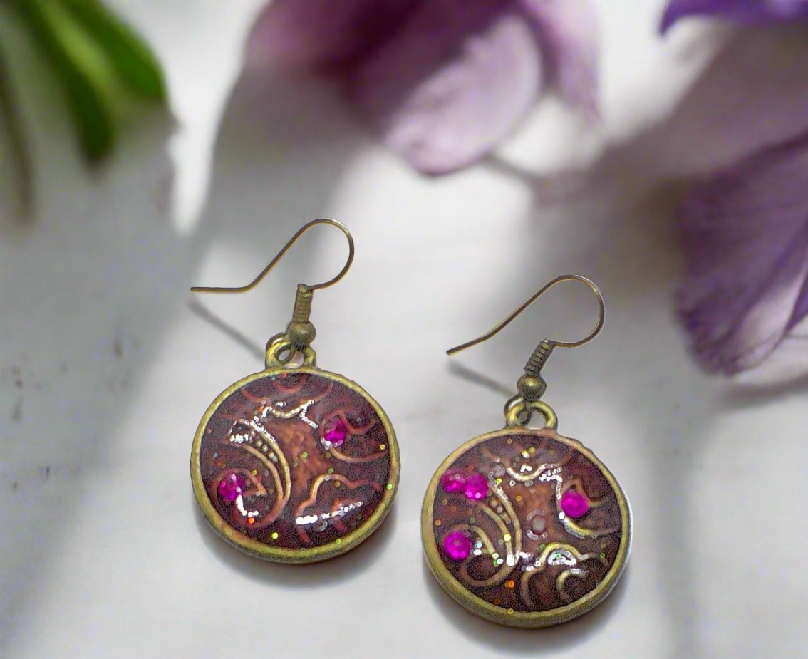 https://www.artistryjewelry.net/products/lovely-purple-earrings-1